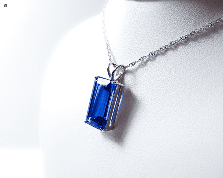 Restored Fine Jewelry Tanzanite Gemstone Necklace on White-Bust