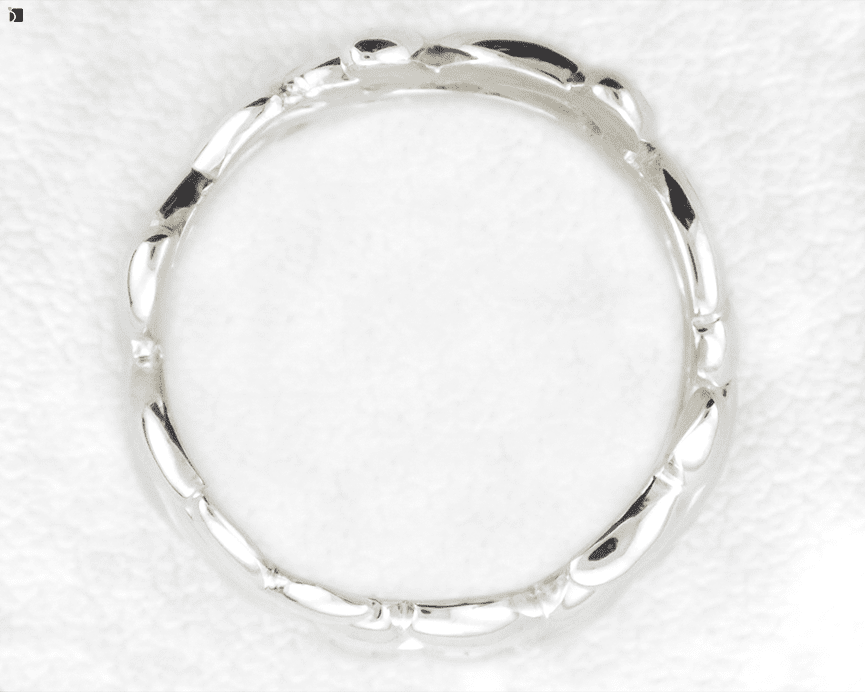 Image Showcasing After #11 Top View of a Silver Floral Designed Ring Getting Extreme Restoration Services by Master Jewelers