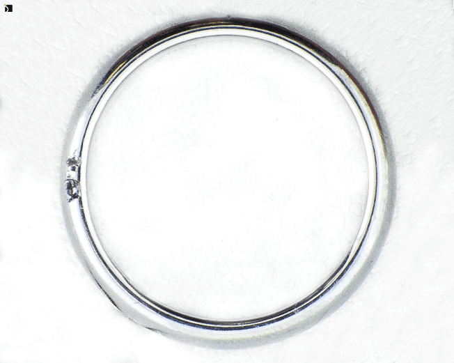 Image Showcasing Before #5 Flat View of a Platinum Ring Getting Premier Ring Repair Services by Master Jewelers