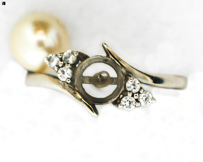 Image Showcasing Before of Before & After #68 Pearl Ring with Diamonds being Restored with Pearl Replacement and Premier Ring Services