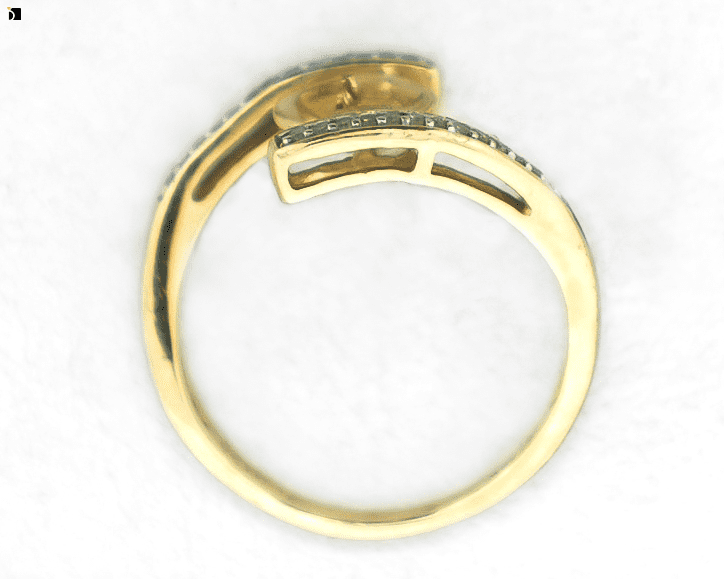 Image Showcasing Flat View Before #84 Pearl Ring with Diamonds being Restored with Pearl Replacement and Premier Ring Services