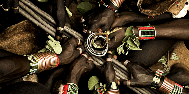 Image showcasing Hamar Tribe Bull Jumping Ceremony