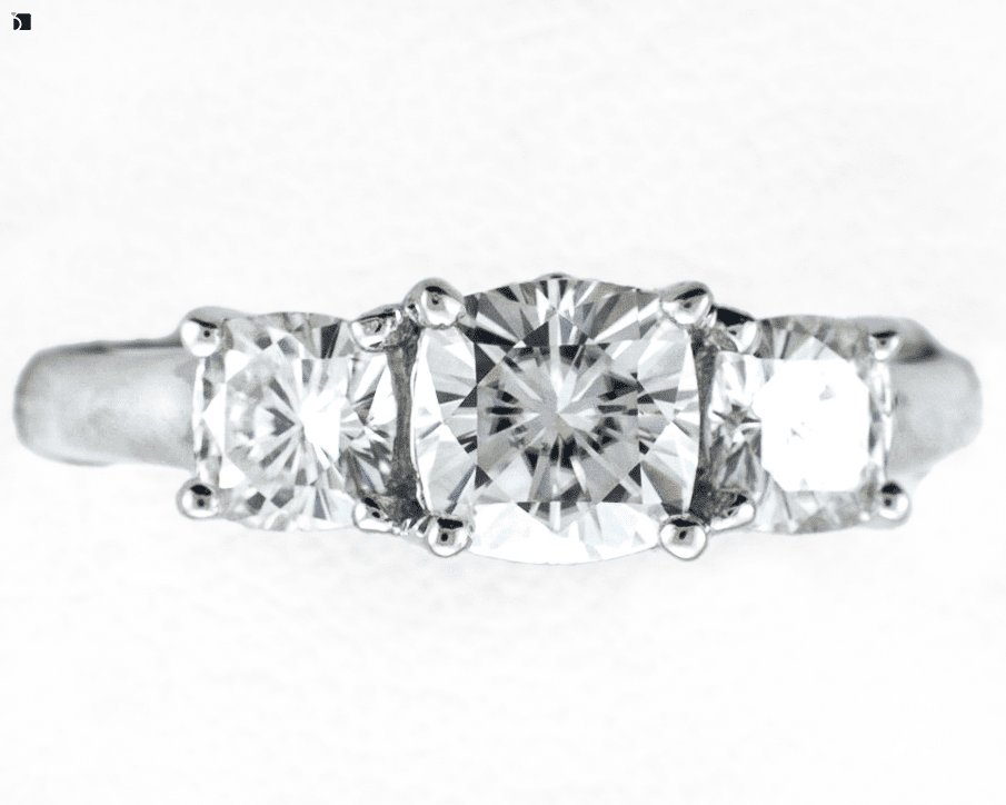 After #38 of a Moissanite Ring Receiving Moissanite Resetting Services by Master Jewelers