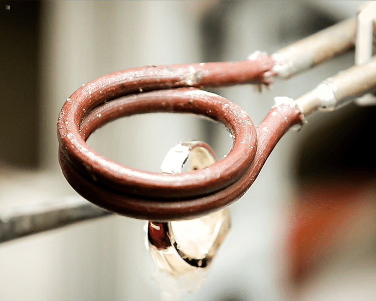 Jeweler Using Heat to Weld Ring Shank For Premier Ring Repair Services