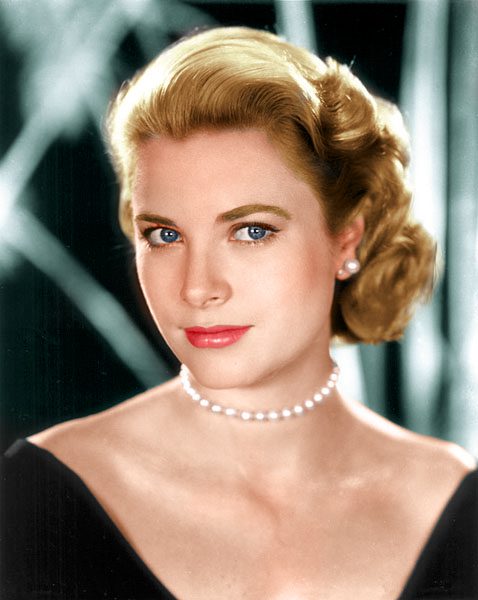 Colored photo showcasing 1950s actress Grace Kelly wearing matching pearl necklace and earring set