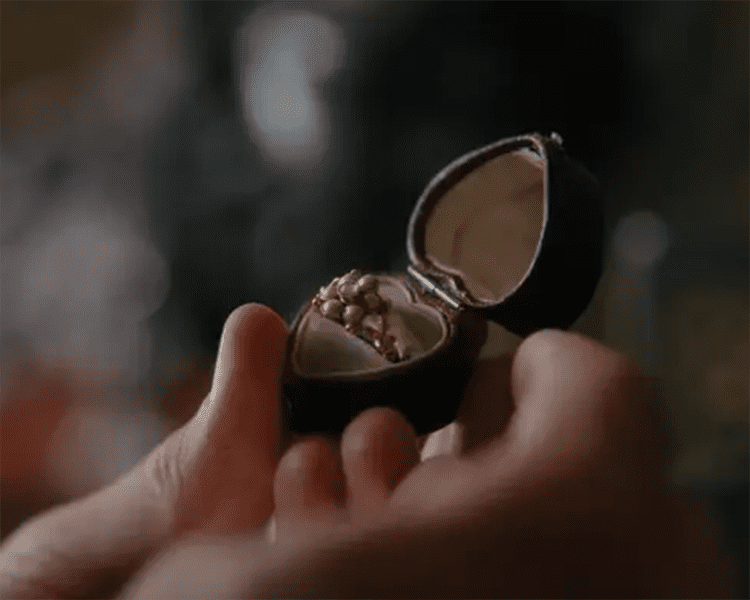 Close Up of Bridgerton Heirloom Engagement Ring Held by Viscount Anthony Bridgerton for Sharma Proposal