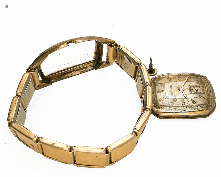 Before #172 Top angled view of broken down vintage Wittnauer timepiece before restoration services