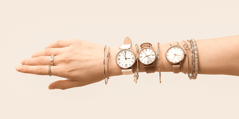 Woman Wearing Multiple Restored Cocktail Watches on Arm