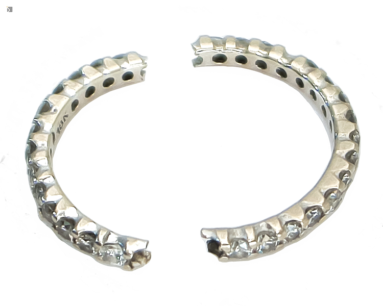Before #177 Top angled view of diamond eternity band broken in half prior to restoration