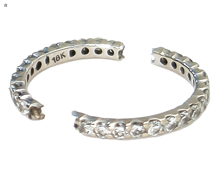 Before #177 Side angled view of diamond eternity band broken in half prior to ring repair services